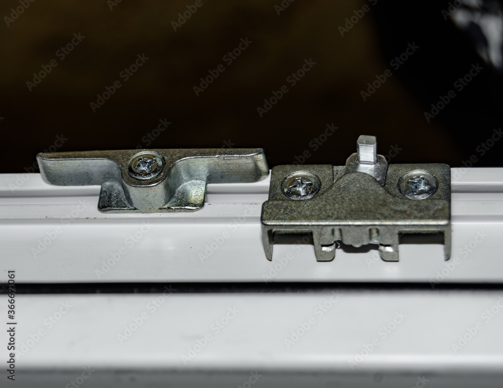 fasteners and connectors for installing and configuring plastic Windows during renovation by service centers close-up. Fuzziness. fasteners and connectors for installing and configuring plastic Windows during renovation by service centers close-up. Fuzziness.