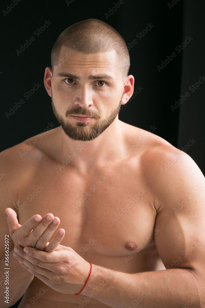 person male muscular man with his arms crossed person male muscular man with his arms crossed