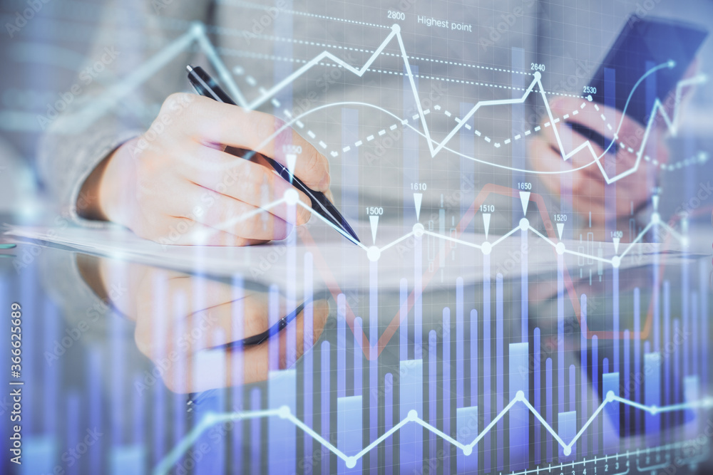 Double exposure of forex chart sketch hologram and woman holding and using a mobile device. Financial market concept. Double exposure of forex chart sketch hologram and woman holding and using a mobile device. Financial market concept.