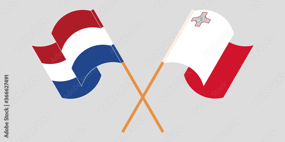 Crossed and waving flags of Malta and the Netherlands Crossed and waving flags of Malta and the Netherlands