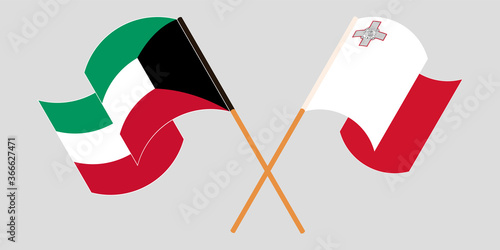 Crossed and waving flags of Malta and Kuwait