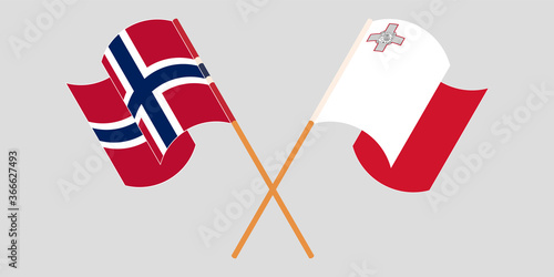 Crossed and waving flags of Malta and Norway