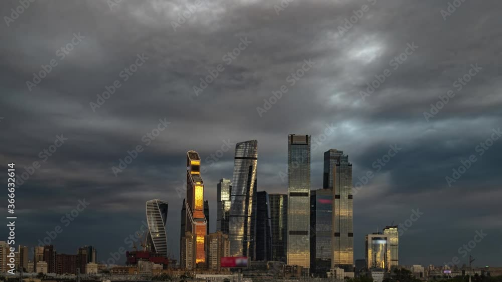 view of the skyscrapers and towers of downtown at sunset, time lapse view of the skyscrapers and towers of downtown at sunset, time lapse