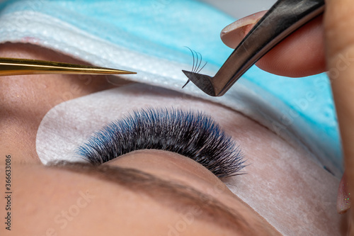 Treatment of Eyelash Extension in blue color with facemask face mask