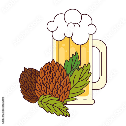 mug of beer with hop seeds on white background