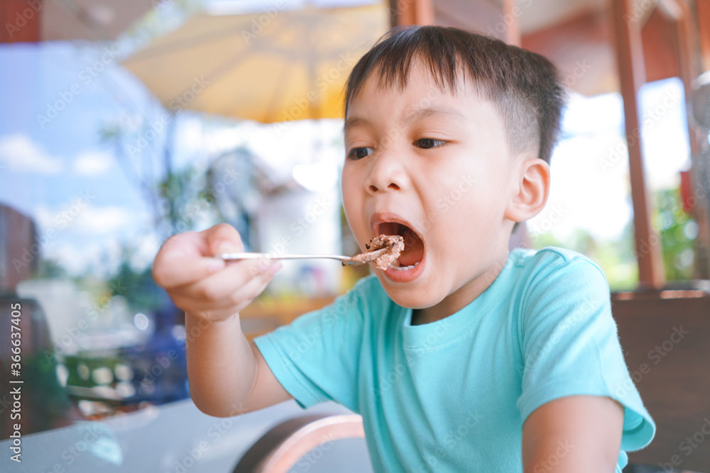 Portrait of cute little boy eating ice cream Portrait of cute little boy eating ice cream