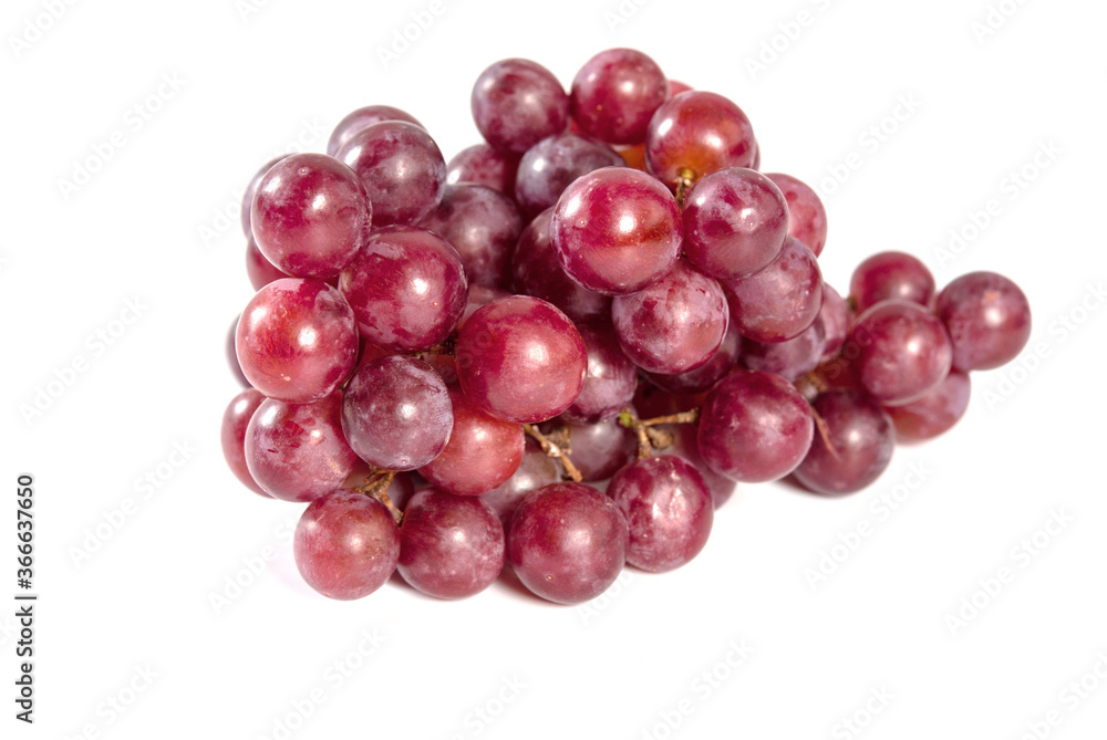 Close up bunch of red grapes isolated on white background