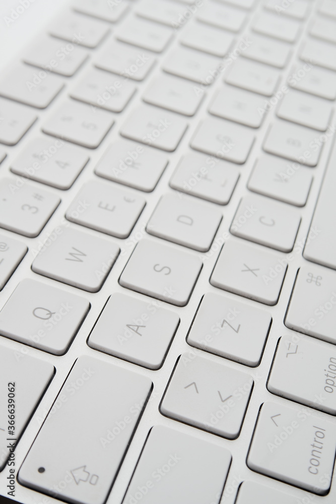 detail computer keyboards in white color, tilted top view detail computer keyboards in white color, tilted top view