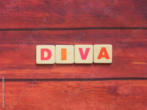 Foto Word Diva on wood background
