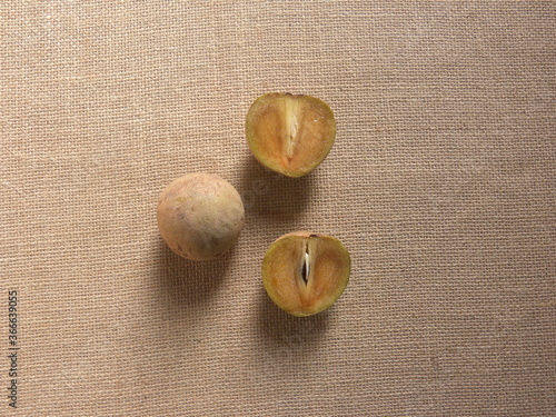 Brown color ripe Sapodilla or Sapota fruits