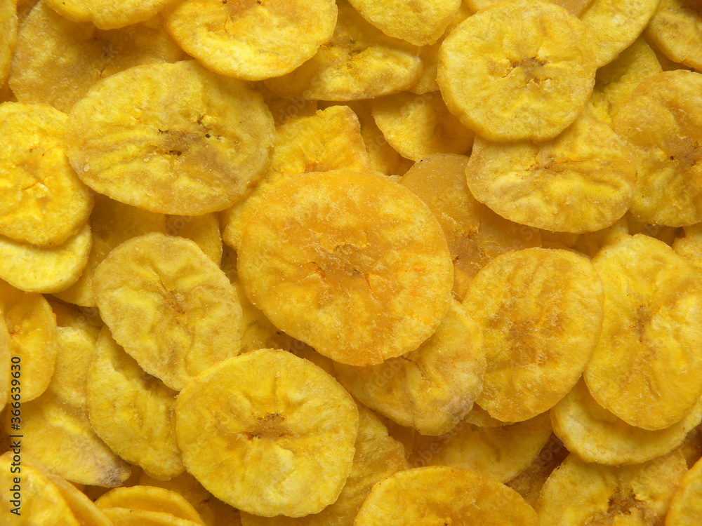 Yellow color dry fried Banana chips snack Yellow color dry fried Banana chips snack