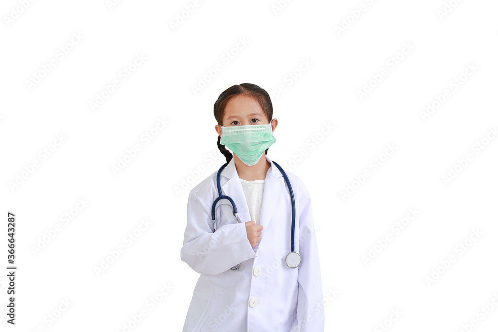 Asian little child girl with stethoscope while wearing doctor's uniform and medical mask isolated on white background