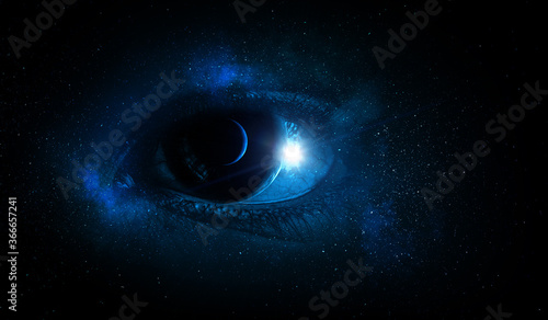 Human eye and space. Elements of this image furnished by NASA.