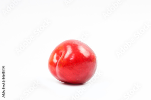 plums on white background