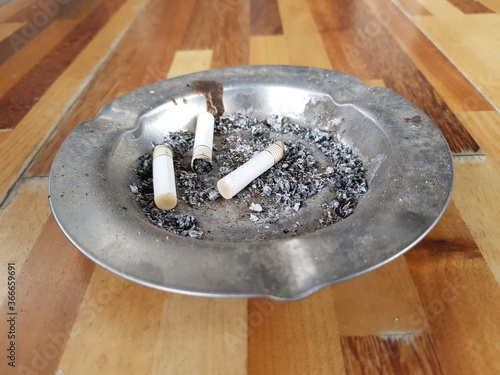 Ashtray With Ashes and Cigarettes