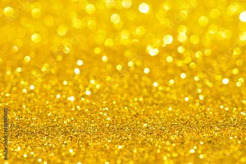 sparkles of golden glitter texture background 