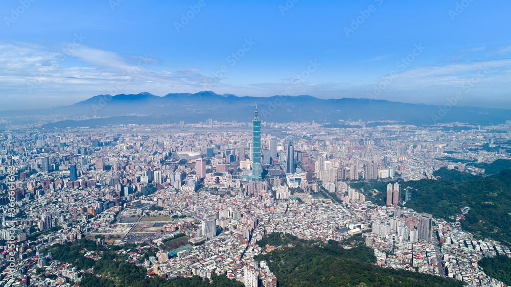 Taipei City Aerial View - Asia business concept image, panoramic modern cityscape building bird’s eye view in morning blue bright sky. Drone photography shot in Taipei, Taiwan.