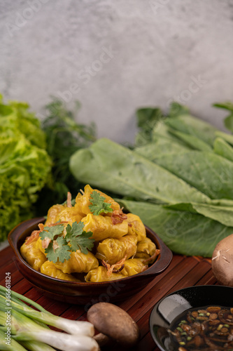 Shumai or Kanom Jeeb or Steamed Pork Dumplings on a plate. photo