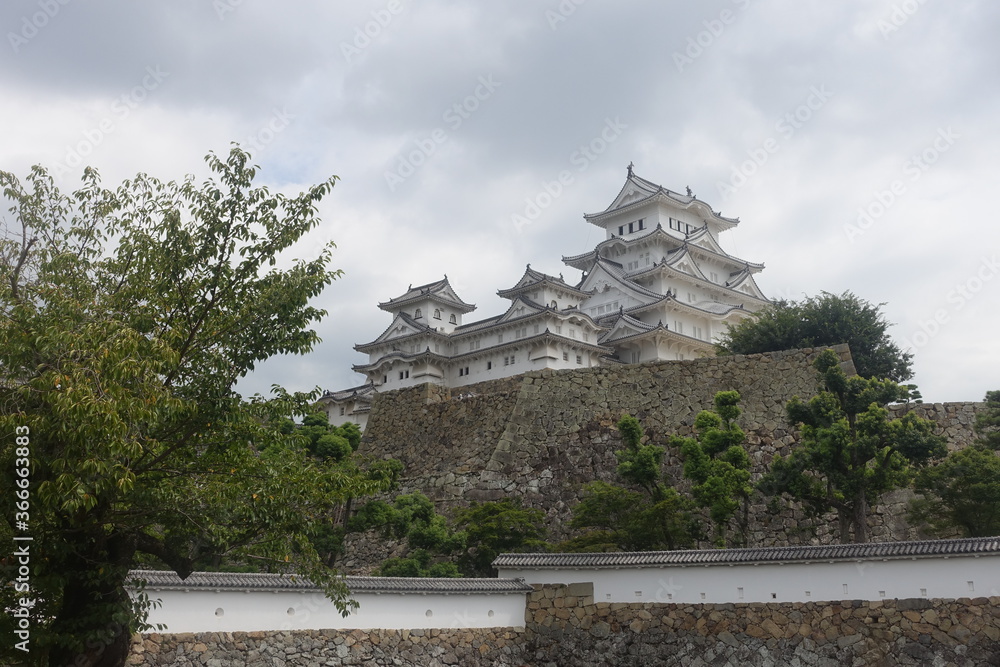 Himeji Castle with cloudy weather in summer, a hilltop Japanese castle
