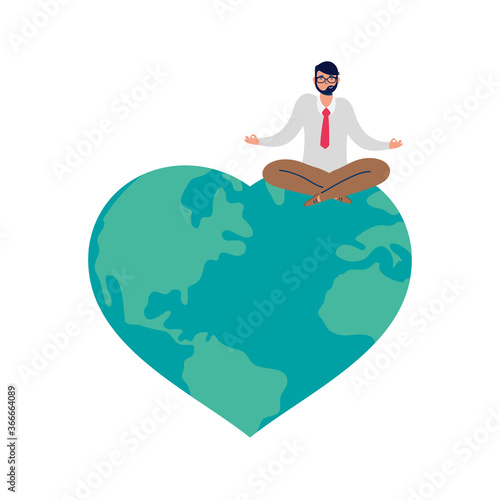 businessman seated in heart planet earth