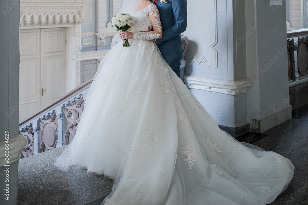bride and groom at a wedding in an old building bride and groom at a wedding in an old building