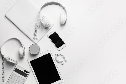 Different modern devices on white background photo