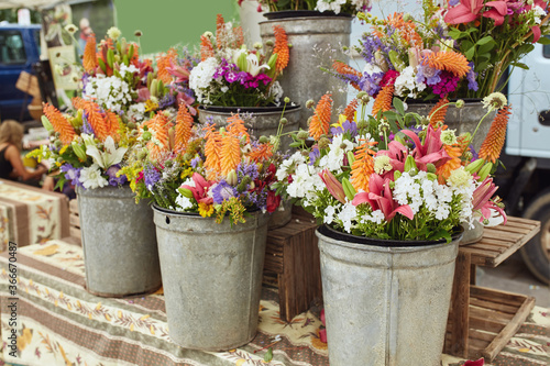 Bouquets of fresh cut flowers on display at a farmers market in Boulder, Colorado. USA