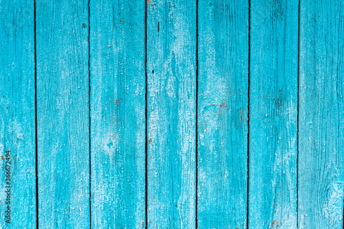 old shabby blue wooden fence