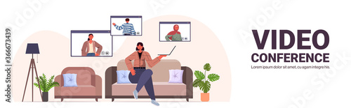 woman chatting with mix race friends during video call people having online conference meeting communication concept living room interior horizontal full length copy space vector illustration