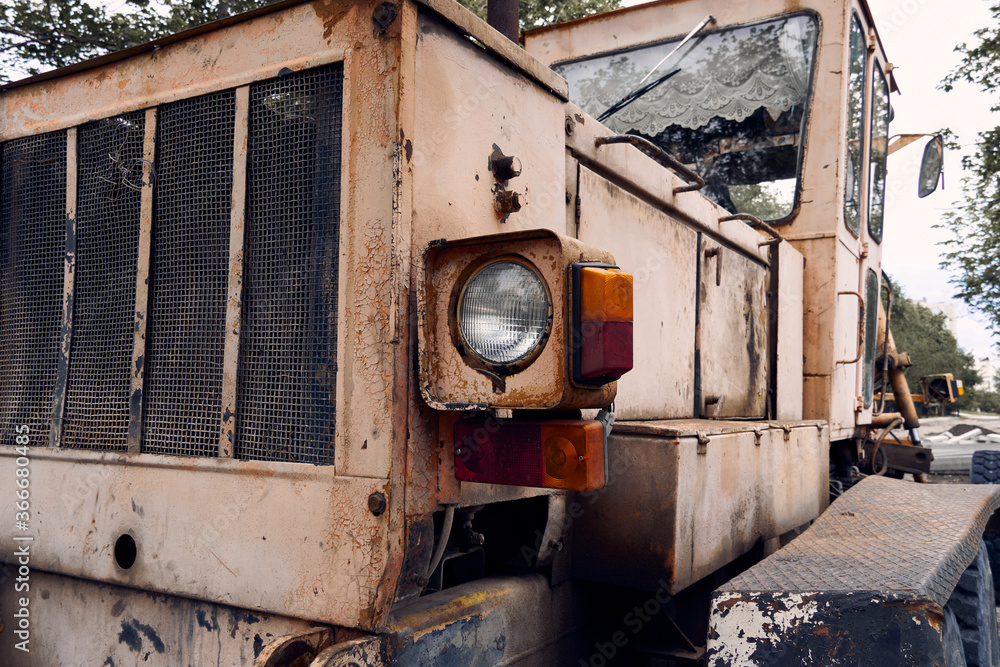 headlight and close view of old tractor parts