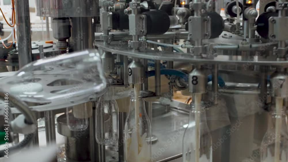 Plastic milk bottles on conveyor or milk bottling machine