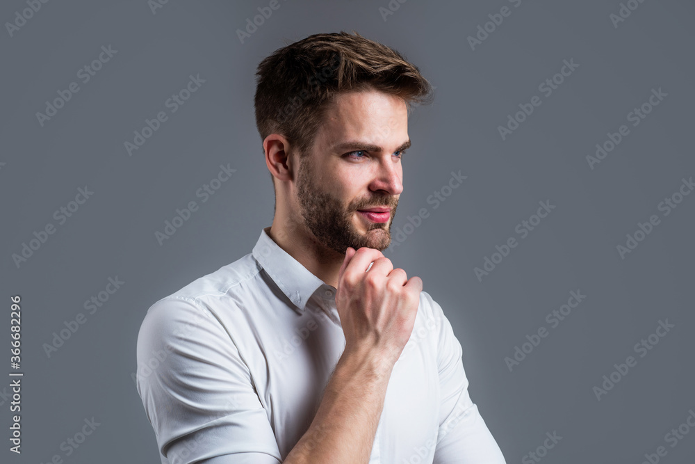 handsome man in white shirt. indoor portrait of sexy european businessman. confident and calm. handsome casual man standing with beard and bristle. cheerful and stylish handsome man in white shirt. indoor portrait of sexy european businessman. confident and calm. handsome casual man standing with beard and bristle. cheerful and stylish
