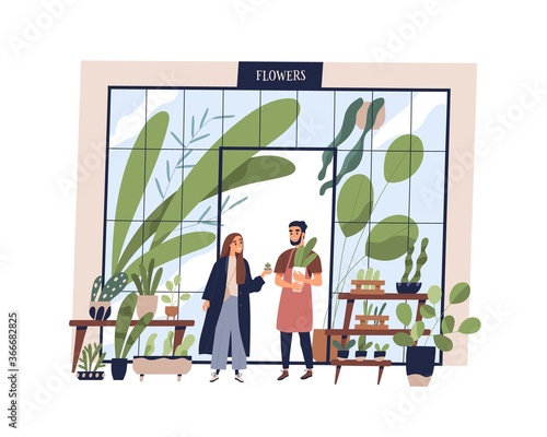 Happy man working at small shop with potted plants vector flat illustration. Male owner of growing and selling flowers at store isolated. Smiling vendor sell houseplant in pot to female buyer