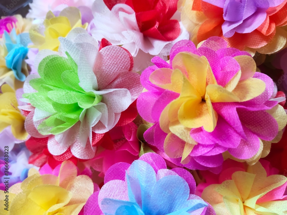 Obraz premium Colorful fake flowers made from mulberry paper