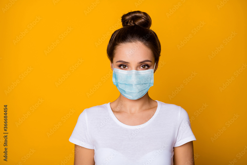 Close-up portrait of her she nice attractive charming pretty girl wearing safety gauze mask stop viral pneumonia syndrome flue contamination prevention isolated vibrant yellow color background Close-up portrait of her she nice attractive charming pretty girl wearing safety gauze mask stop viral pneumonia syndrome flue contamination prevention isolated vibrant yellow color background