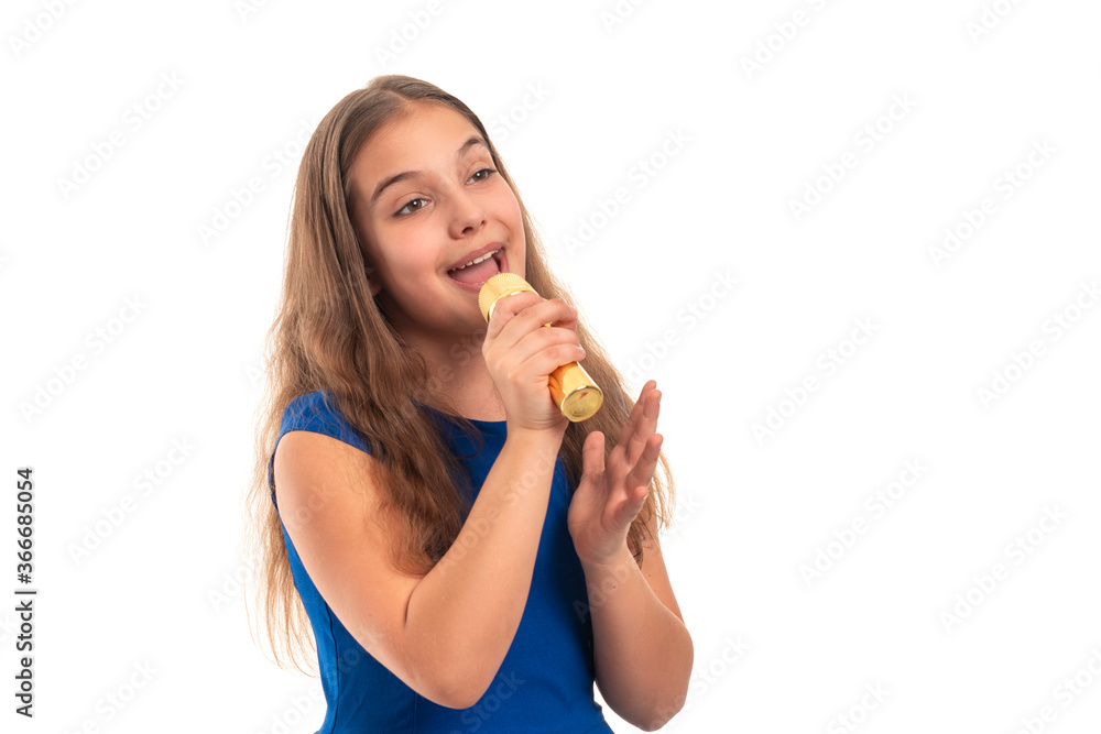 Shot of attractive girl singing song while holding microphone in hands, isolated Shot of attractive girl singing song while holding microphone in hands, isolated