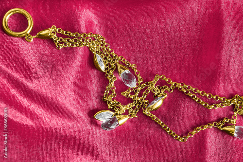 Necklace on pink silk