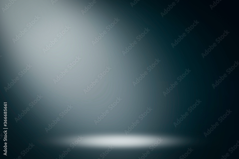 Obraz premium On a black background, the spotlight shines down. Light source, artificial light.
