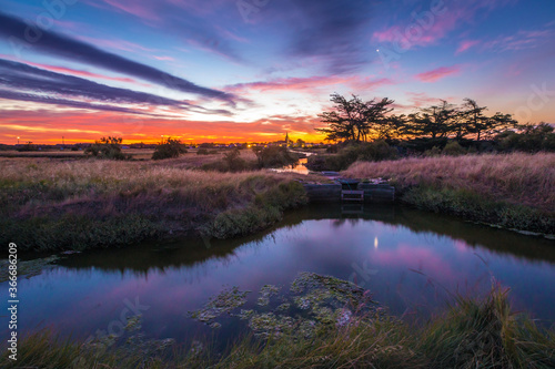 Panoramic view of the salt marshland at sunrise, Olonne area, Vendee, France photo