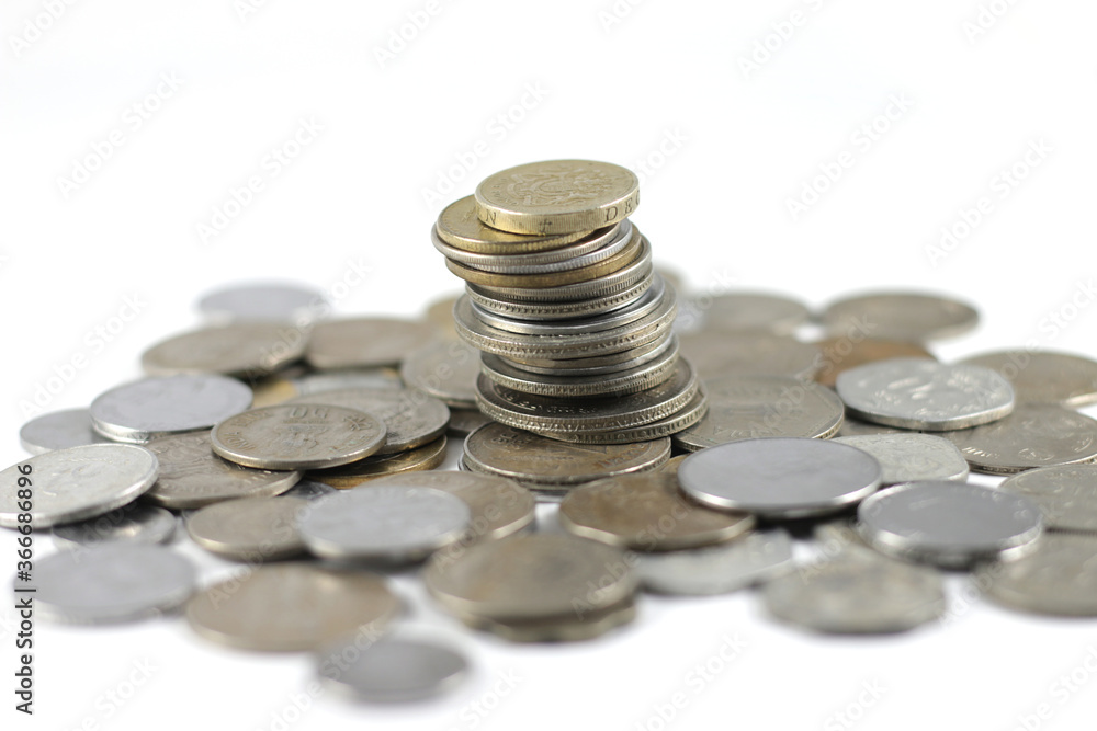Currency coins of rupees five, rupee one, rupees two and more. Image depicting currency, expenses savings and investments. Currency coins of rupees five, rupee one, rupees two and more. Image depicting currency, expenses savings and investments.
