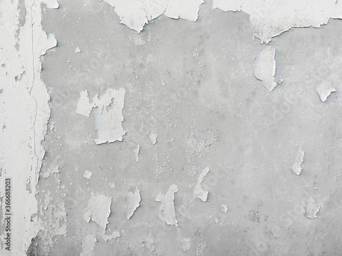 Grunge peeling white texture of plaster concrete wall background