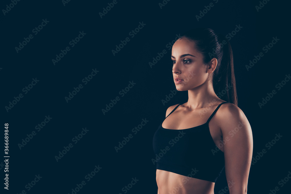 Profile side view portrait of her she nice-looking attractive lovely sportive confident content focused strong muscular lady fitness model healthy life style isolated over black background Profile side view portrait of her she nice-looking attractive lovely sportive confident content focused strong muscular lady fitness model healthy life style isolated over black background