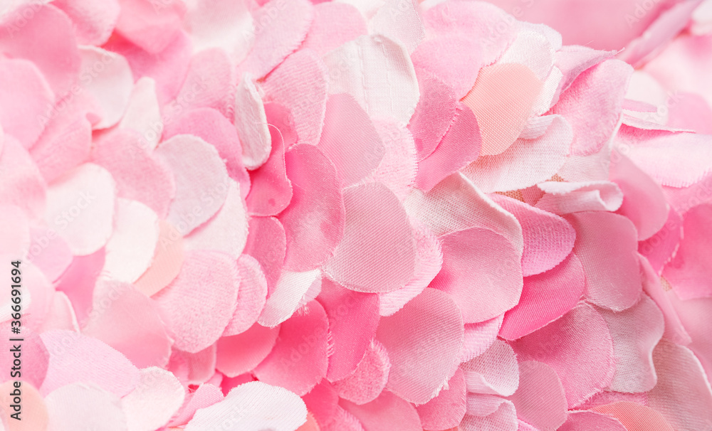 Composition of light spring pink textile petals.