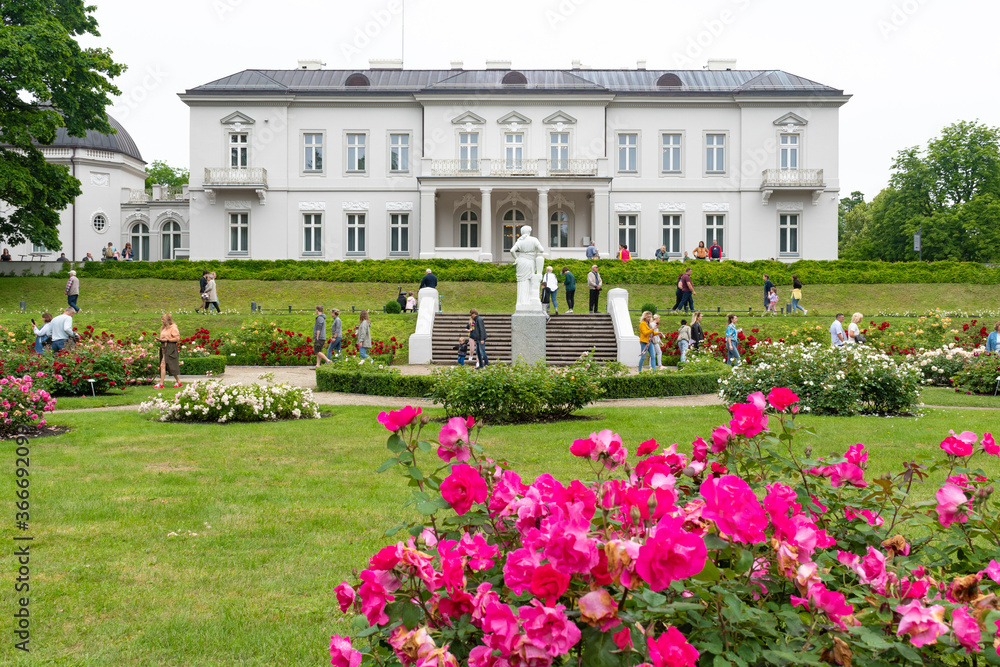 Amber museum in Palanga, Lithuania, view from the garden with flowers, roses and green grass