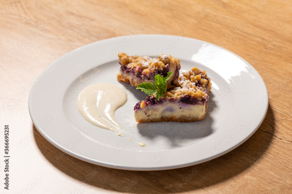 Fruit cake dessert served on white plate