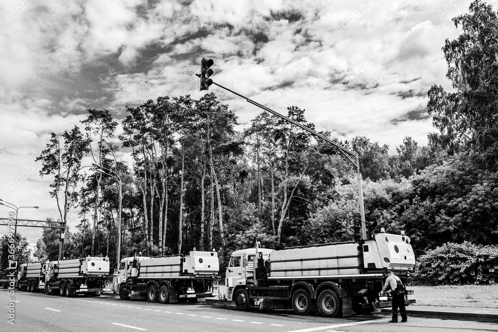 Obraz premium Trucks are parked on the road