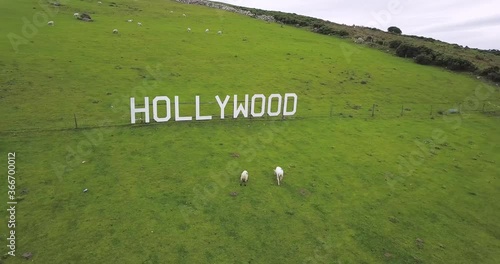 Irish village Hollywood sign point of view close up aerial shot
