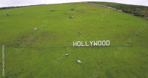Irish village Hollywood sign reveal aerial shot