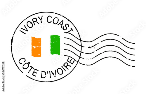 Postal grunge stamp IVORY COAST. Waving flag in the middle. English and french inscription.