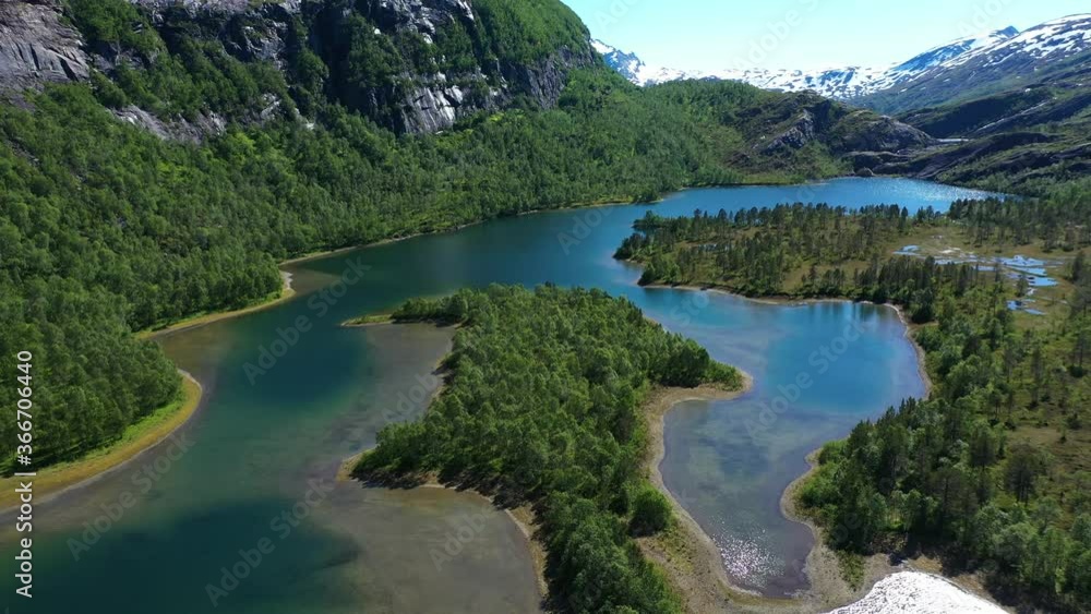 Pull back drone shot flying backwards above amazing ponds, tarns, lakes at mountains. Pull back drone shot flying backwards above amazing ponds, tarns, lakes at mountains.